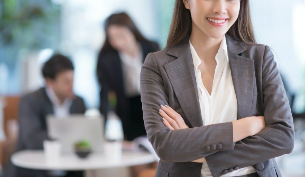 Portrait of successful young asian businesswoman at office