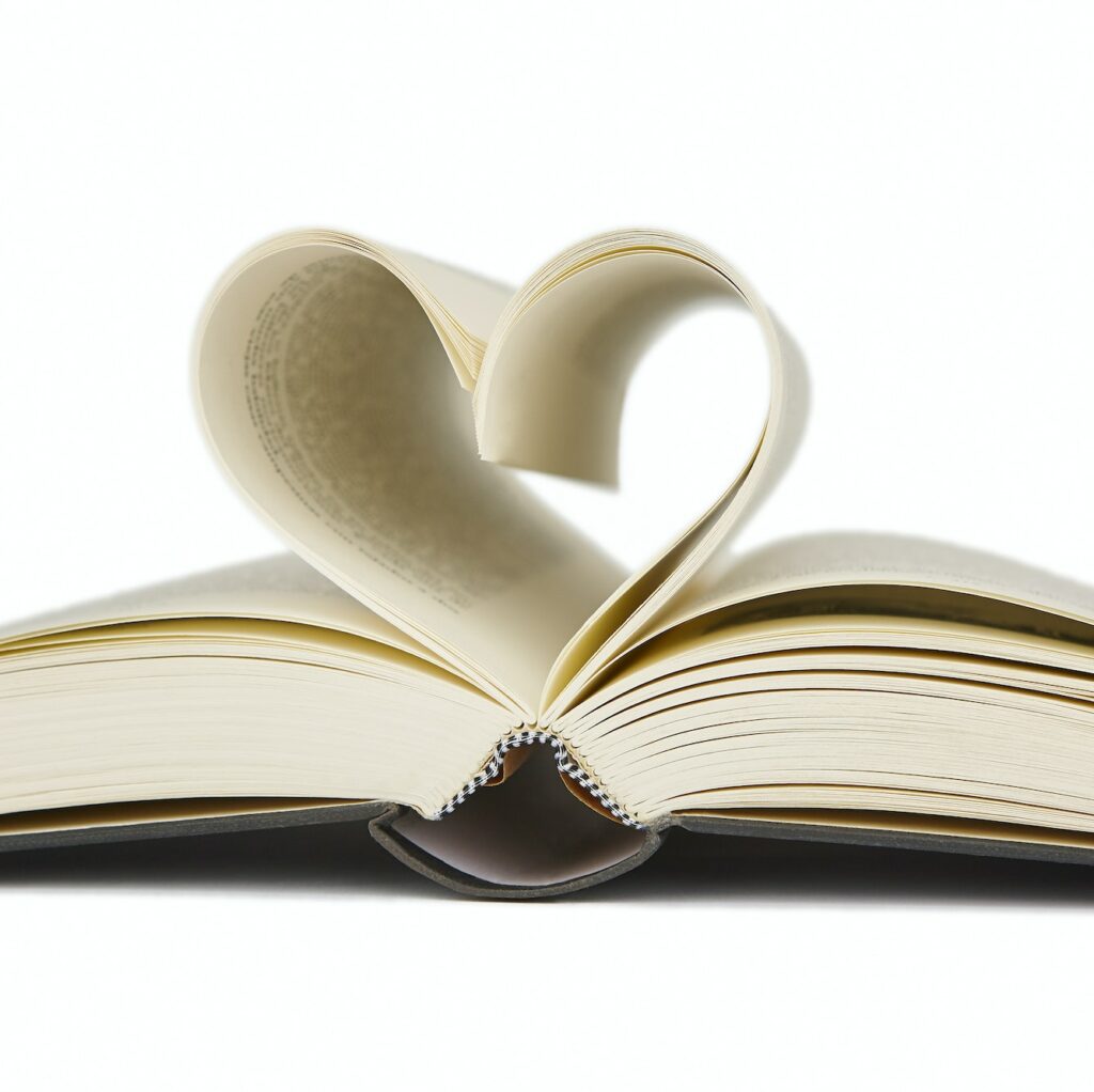 Open book with heart shaped pages. Love for reading